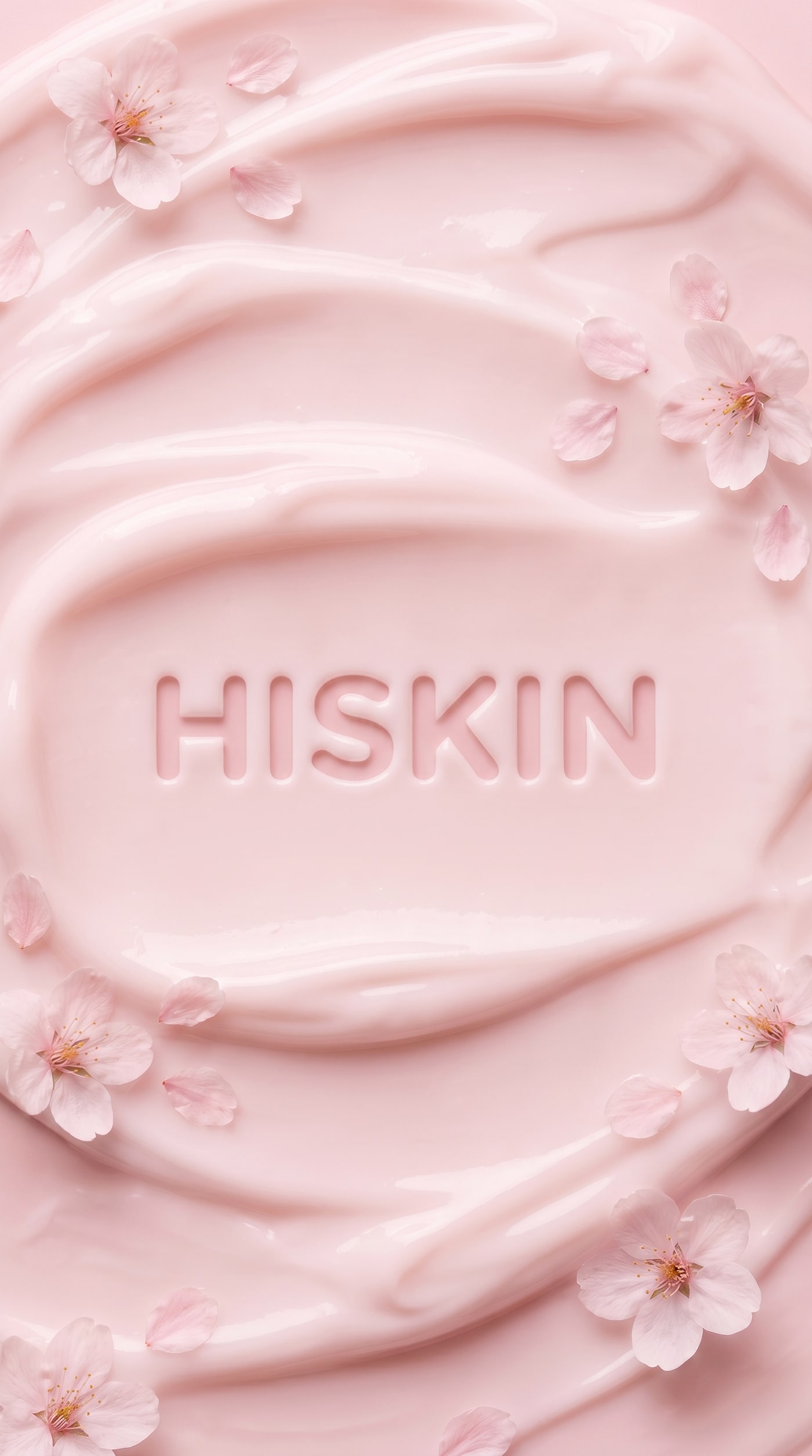 벚꽃잎에 둘러싸인 연분홍 제형 위에 HISKIN 글씨를 새긴 클로즈업